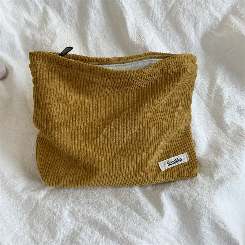 Spacious Corduroy Travel Makeup Bag with Secure Zipper Closure